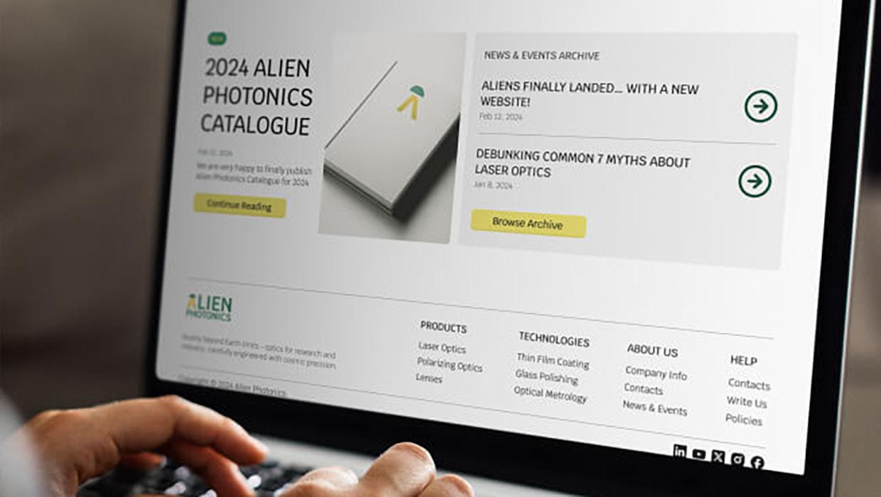 Alien Photonics website on laptop