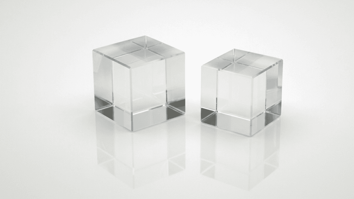 Two polarizing beamsplitter cubes in white, laboratory clean room background